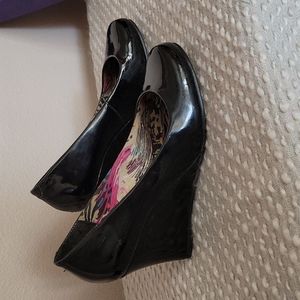Gently used black patent leather shoes